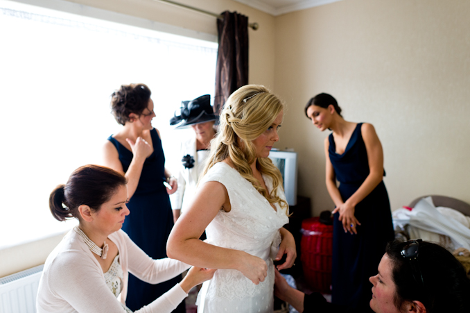 bride getting dressed